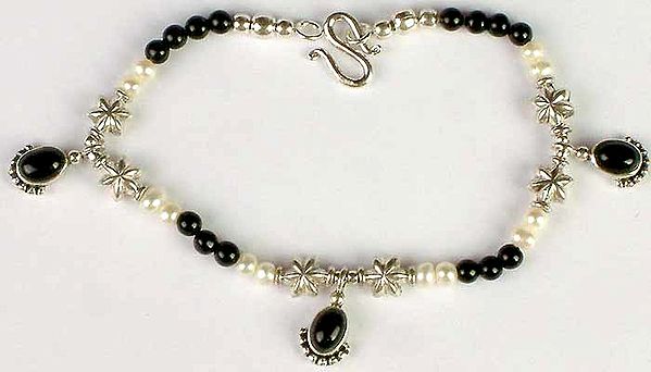 A Fine Contrast of Black Onyx and Pearl