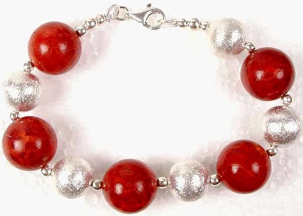 Bracelet of Indonesian Coral with Matt Finish Sterling Balls