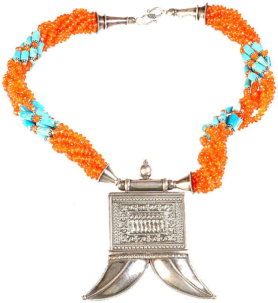 A Carnelian and Turquoise Necklace with Tiger Claws Amulet