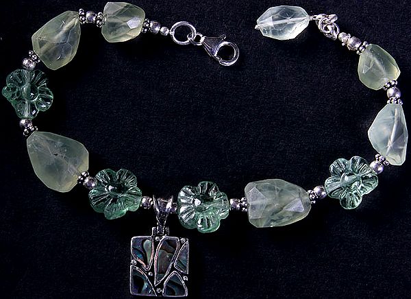Faceted Aquamarine Beaded Bracelet with Carved Flowers and Abalone Charm