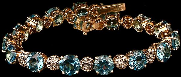 Faceted Blue Topaz Gold Bracelet with Diamonds