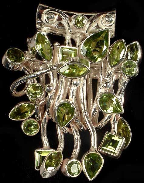 Faceted Peridot Pendant in Sterling Veins