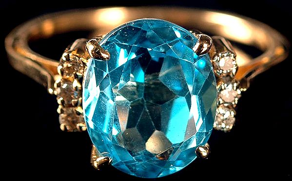 Fine Cut Blue Topaz Ring with Diamonds