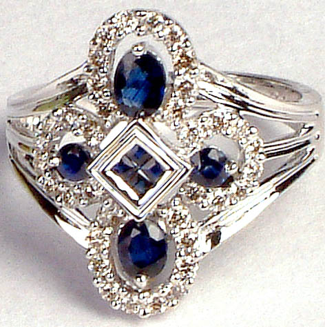 Fine Ring with Eight Sapphires and Thirty-Six Diamonds in White Gold
