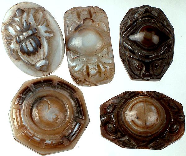 Lot of Five Carved Onyx Lotus, Evil Eyes and Yin Yang