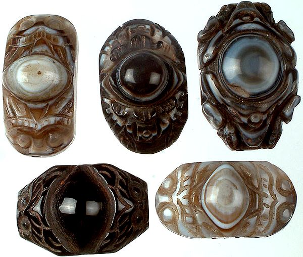 Lot of Five Carved Onyx Eyes