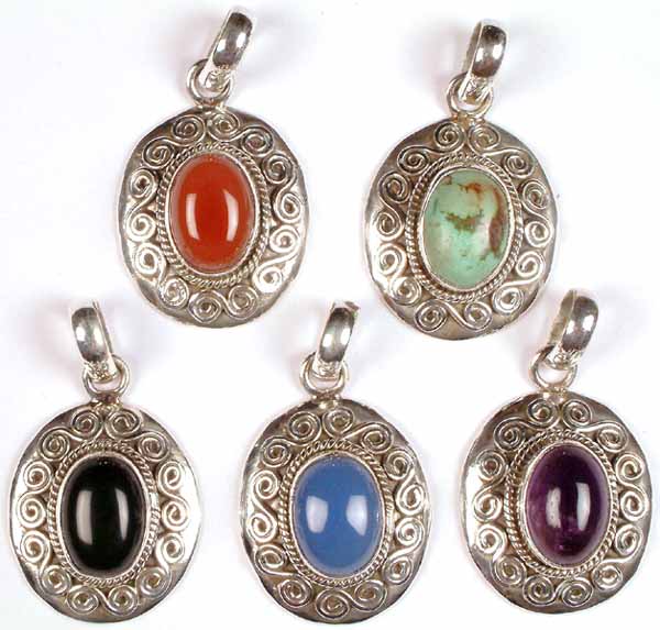 Lot of Five Oval Pendants with Spiral