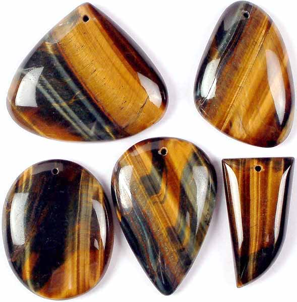 Lot of Five Top-Drilled Tiger-Eye Cabochons