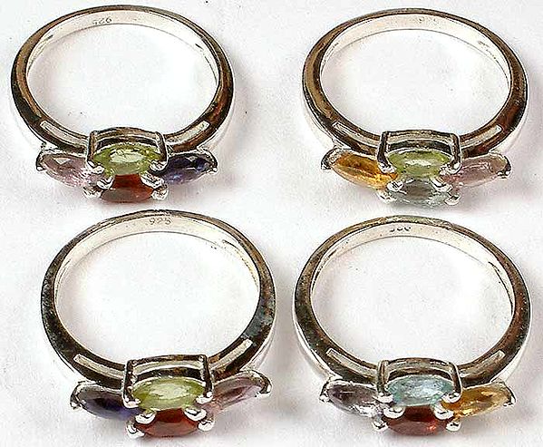 Lot of Four Faceted Gemstone Rings