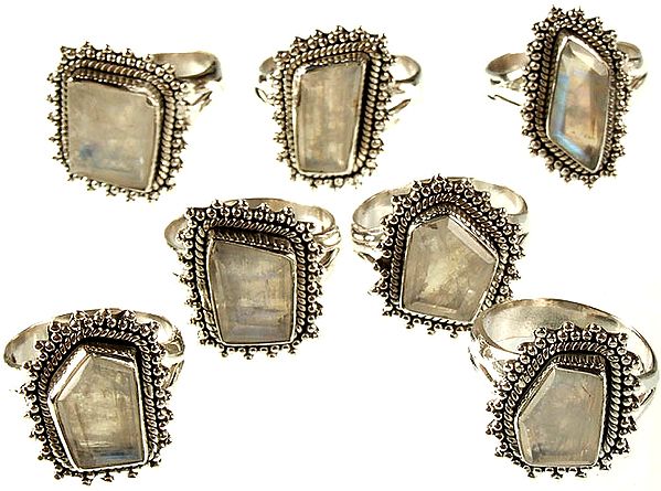 Lot of Seven Faceted Rainbow Moonstone Rings