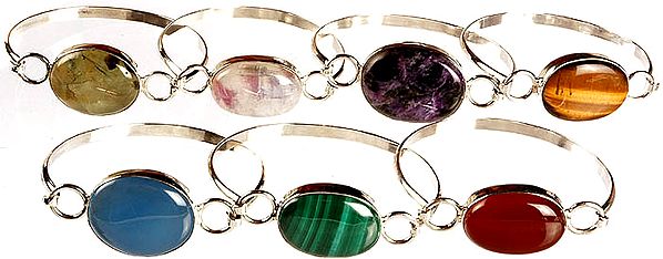 Lot of Seven Gemstone Bracelets (Prehinite, Rainbow Moonstone, Sugilite, Tiger Eye, Blue Chalcedony, Malachite and Carnelian)