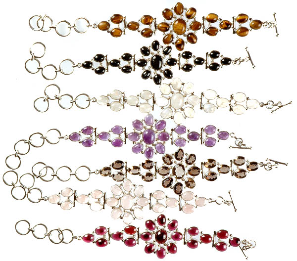 Lot of Seven Gemstone Flower Bracelets (Tiger Eye, Black Onyx, Rainbow Moonstone, Amethyst, Faceted Smoky Quartz, Rose Quartz and Garnet)