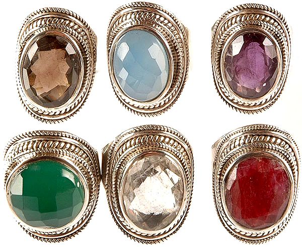 Lot of Six Faceted Gemstone Finger Rings (Smoky Quartz, Blue Chalcedony, Amethyst, Green Onyx, Crystal and Ruby)
