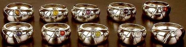 Lot of Ten Gemstone Rings<br>(Tiger Eye, Yellow Chalcedony, Amethyst, Black Onyx, Iron Tiger Eye, Lapis Lazuli, Jasper, Canadian Jade, Chalcedony & Pink Opal)