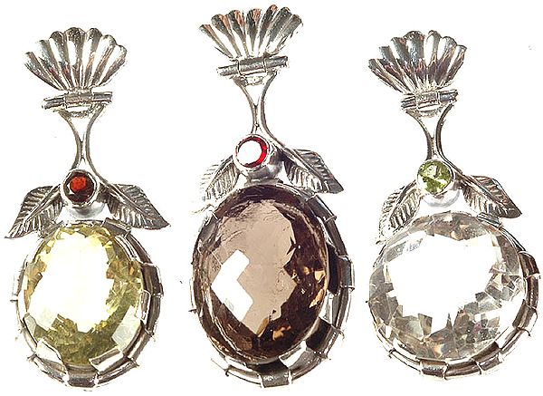 Lot of Three Faceted Gemstone Pendants (Lemon Topaz, Smoky Quartz and Crystal with Garnet and Peridot)