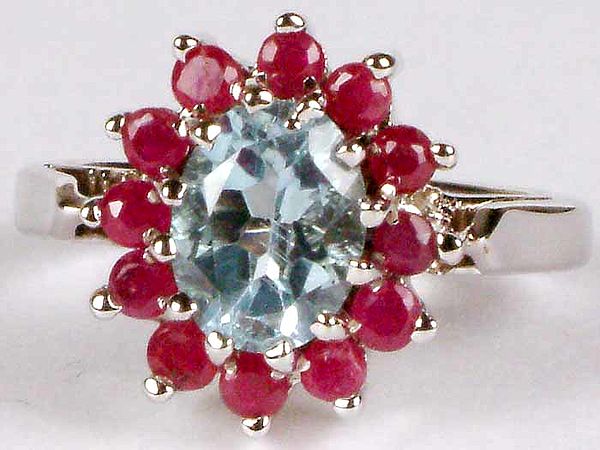 Ring of Fine Cut Blue Topaz and Ruby in White Gold Finish