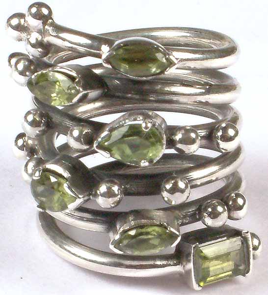 Spiral Ring with Faceted Peridot