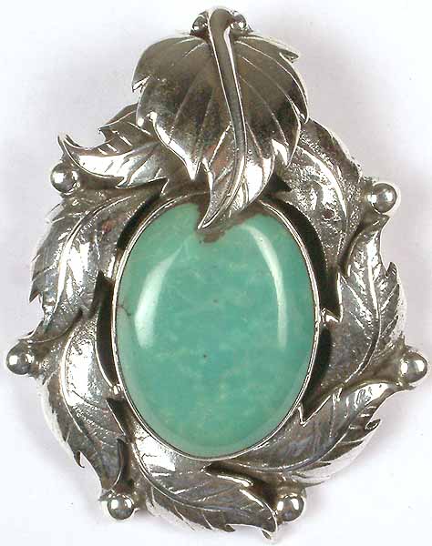 Turquoise Pendant in Grip of Leaves
