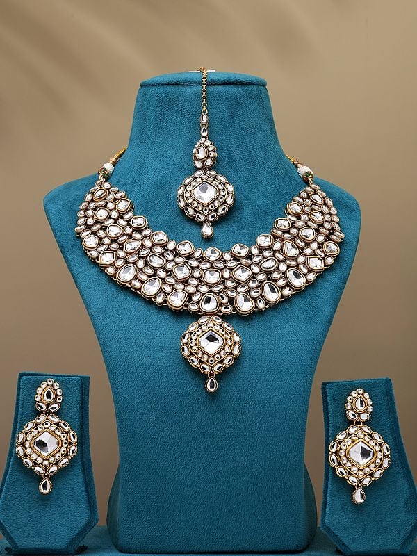 White Kundan Studded Necklace with Earrings and Mangtika Set