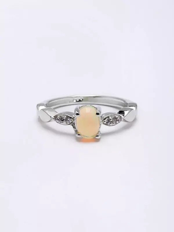 Cabochon Ethiopian Opal Ring with Cubic Zirconia