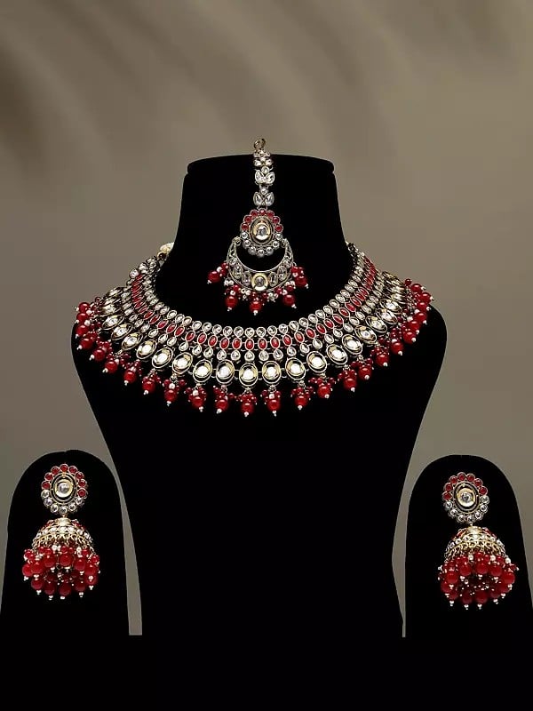 Red and White Stone Studded Necklace Set with Earrings and Mangtika with Beads Drop