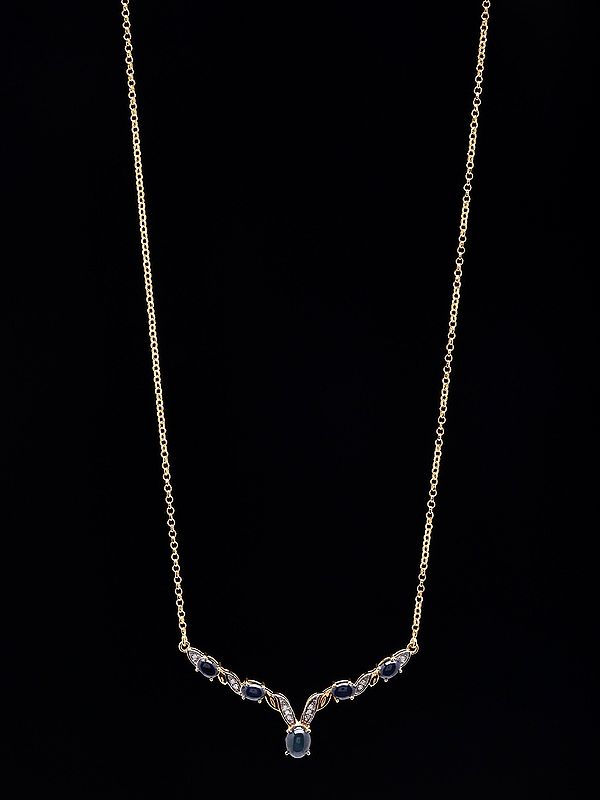 Leaf Motif Sterling Silver Necklace Featuring Blue Sapphires