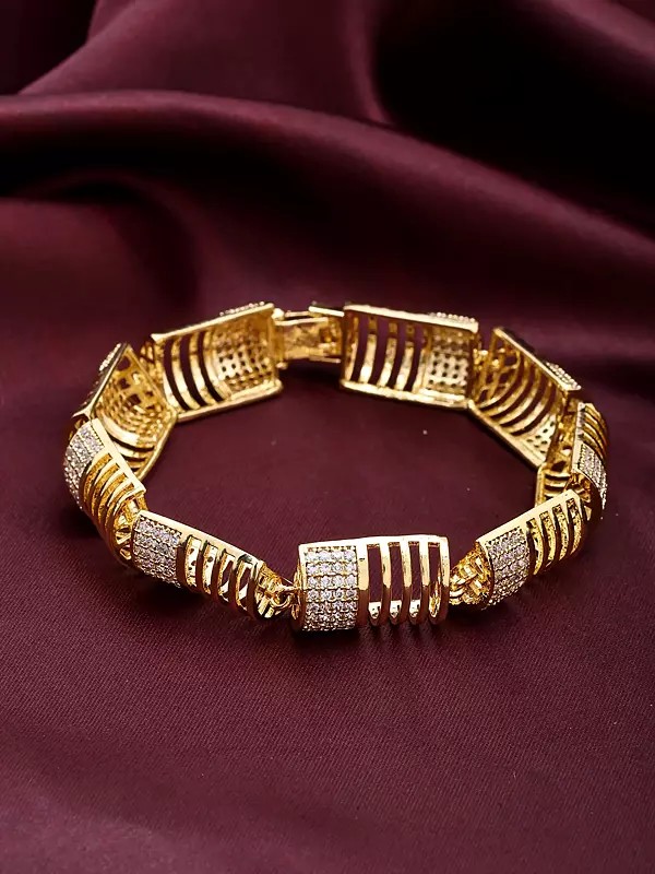 Gold Tone Bracelet with Sparkling Cubic Zirconia and Ribbed Detailing