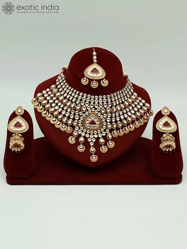 Red Kundan Stone Heavy Necklace Set With Mangtika And Earrings