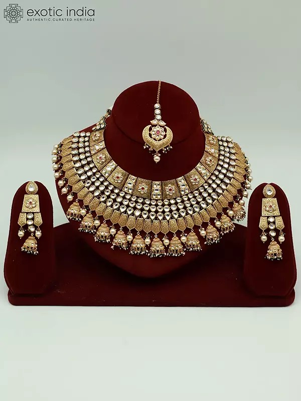 Attractive Kundan Stone Necklace Set In Brass With Mangtika And Hanging Beads Earrings For Bride