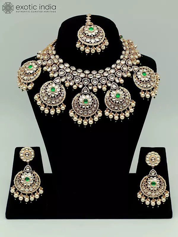 Stone Studded Brass Heavy Necklace Set With Earrings And Mangtika