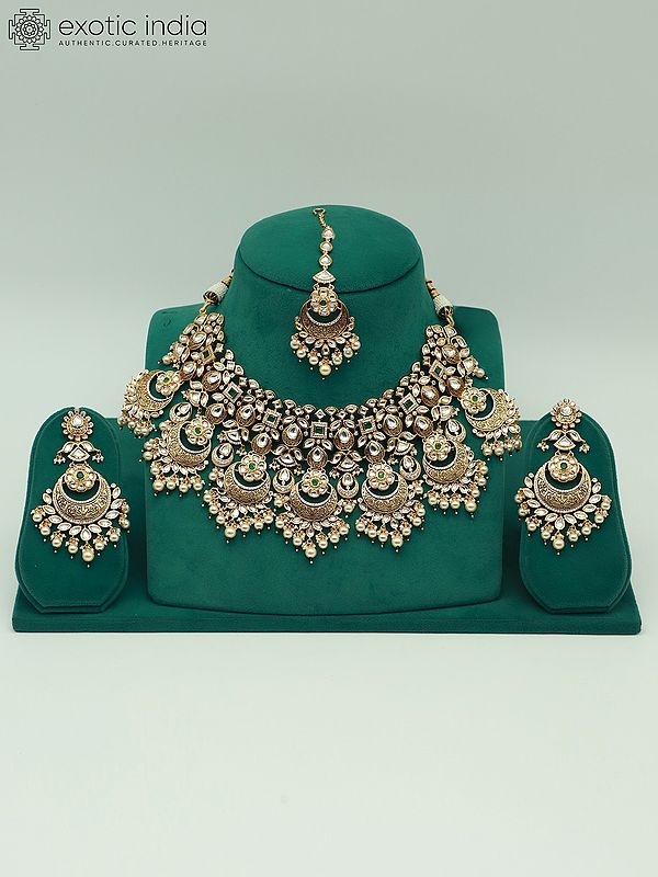 Heavy Kundan Necklace Set With Mangtika And Dangling Pearl Earring