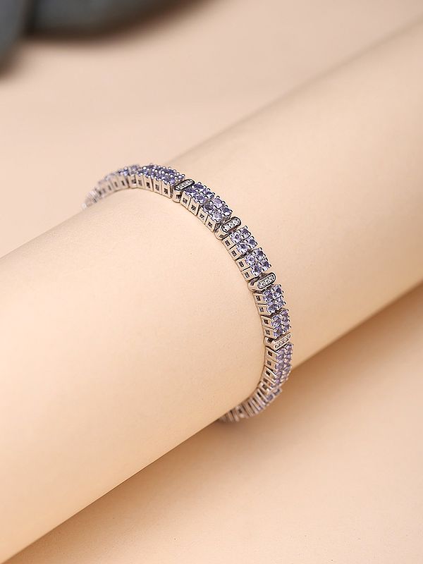 Faceted Tanzanite Tennis Bracelet with White Topaz