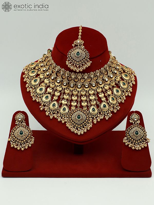 Heavy Bridal Necklace Set With Studded Kundan Mangtika And Attractive Earrings
