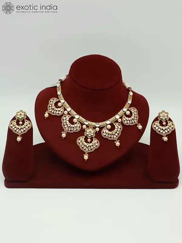 Brass Necklace Set With Kundan Studded Earrings And Hanging Beads