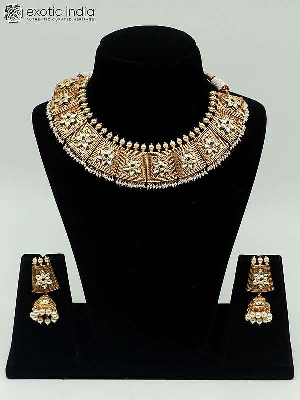 Designer Necklace Set In Matte Finish With Carving And Attractive Earrings