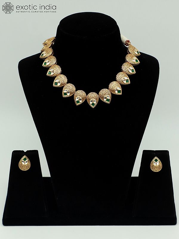 Kundan Studded Light Necklace Set With Brass Carving Tops For Women