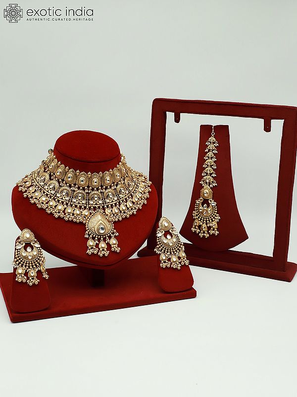 Brass Heavy Necklace Set For Bride With Attractive Carving Earrings And Elegant Mangtika
