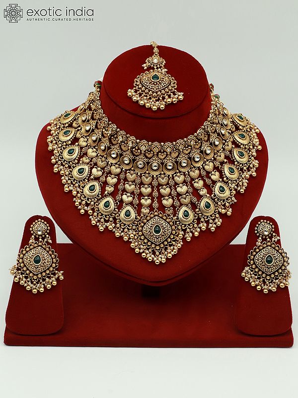 Traditional Necklace Set With Intricate Carvings And Beautiful Earrings