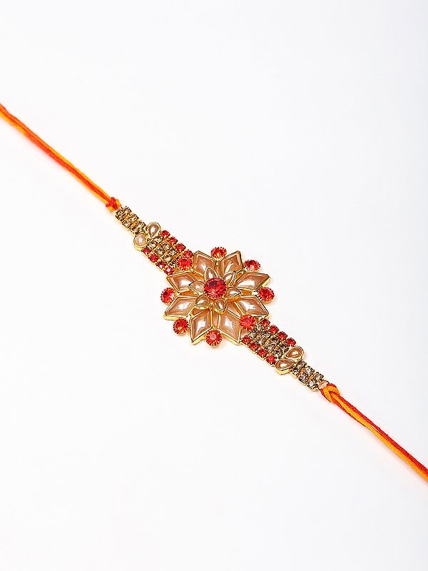 Rajasthani Look Floral Design Red and Gold Studded Stone Rakhi (Raksha Sutra)