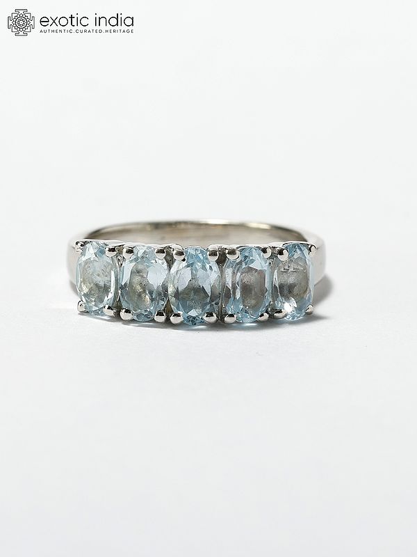 Oval Cut Faceted Blue Topaz Ring