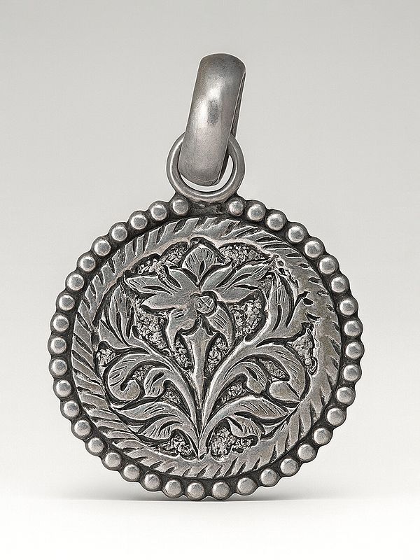 Sterling Pendant with Carved Flower