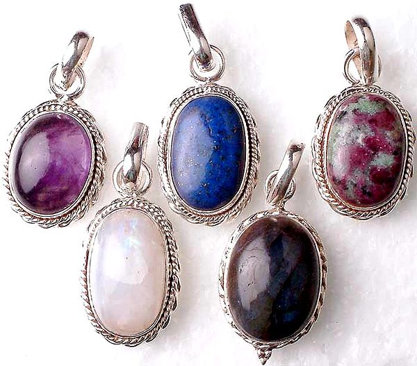 Lot of Five Small Oval Pendants