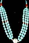 Turquoise Bead Necklace Embellished with Coral and Silver