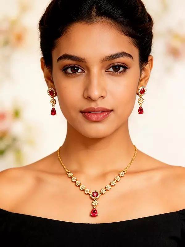 Sterling Silver Necklace and Earring Set with Floral Design and Red Zircon