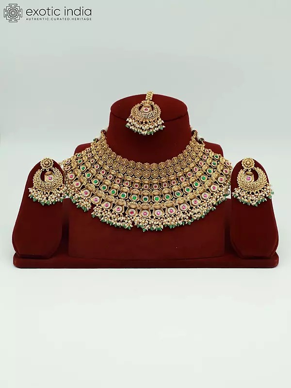 Embellished Stone Studded And Beaded Stunning Necklace With Earrings And Mangtika