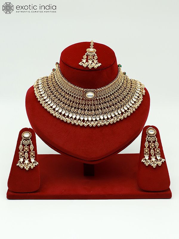 Beaded And Stone Studded Attractive Choker Necklace With Matching Earrings And Mangtika
