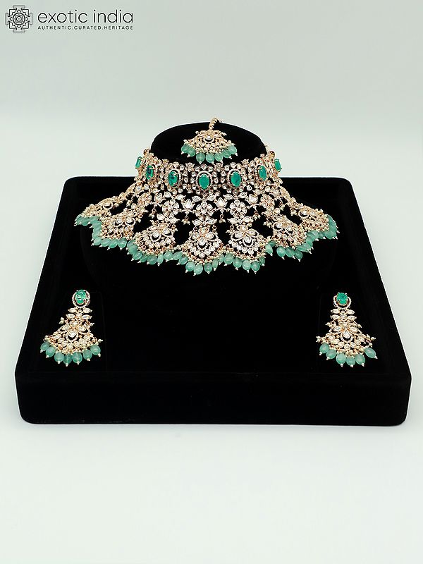 Embellished Floral Design Stone Studded And Beaded Choker Necklace With Earrings And Mangtika