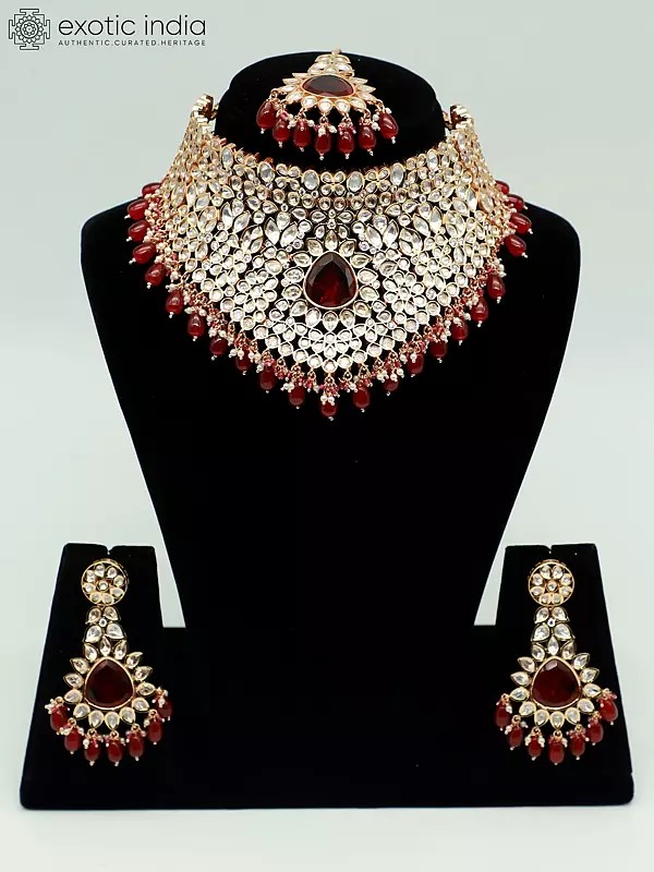 Choker Design Stone Studded And Beaded Necklace With Matching Earrings And Mangtika