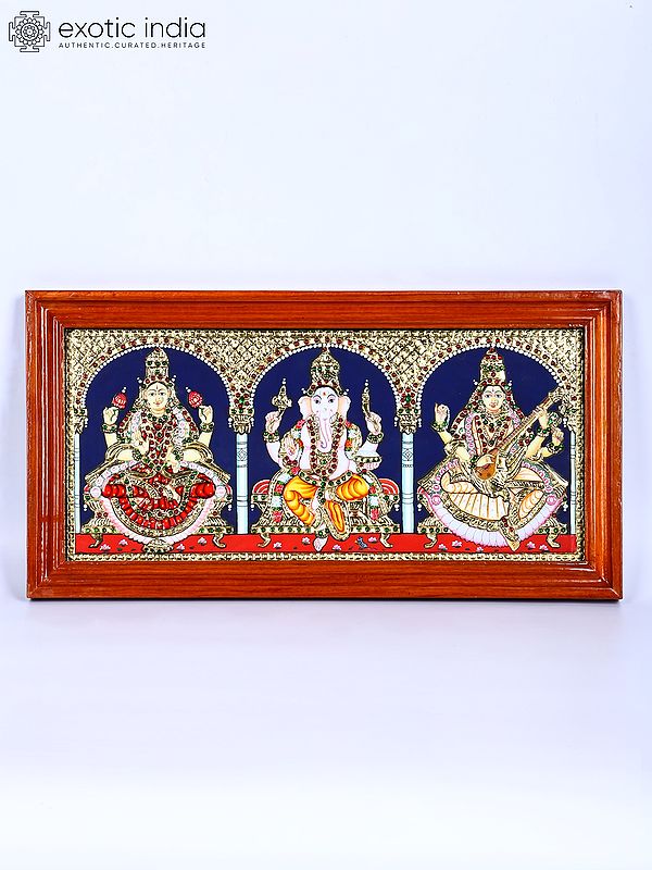 Goddess Lakshmi, Lord Ganesha and Devi Saraswati | 24 Karat Gold Work | Framed Tanjore Painting