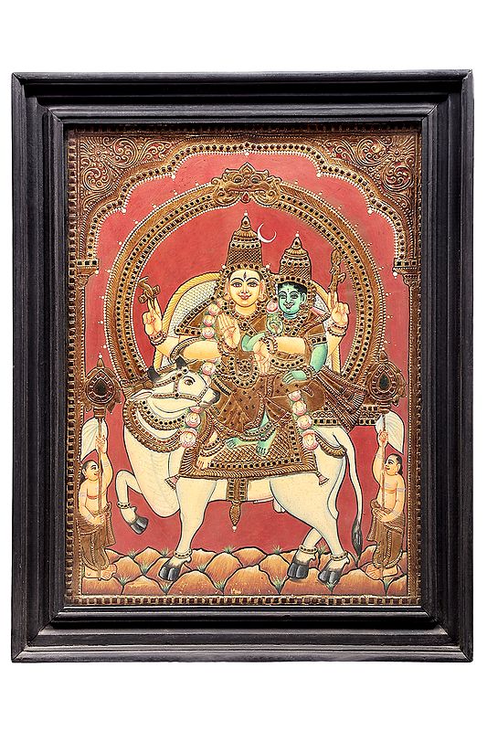 Lord Shiva with Parvati Seated on Nandi Tanjore Painting | Traditional Colors With 24K Gold | Teakwood Frame | Gold & Wood | Handmade | Made In India